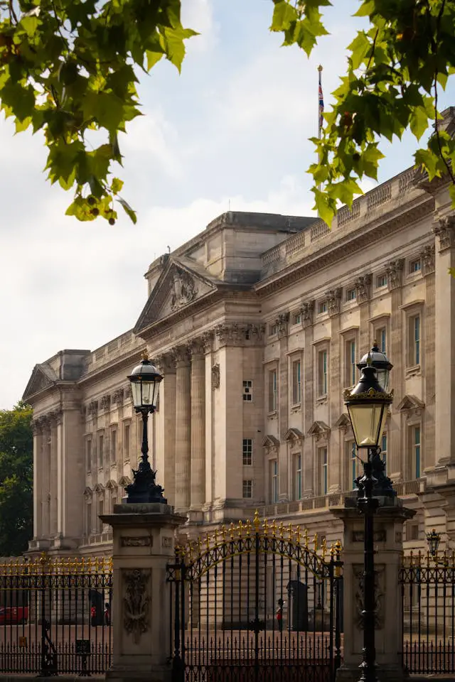 the buckingham palace is a large building with a gate