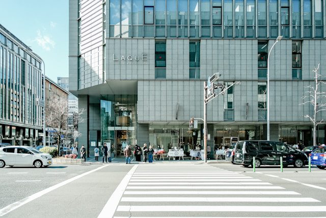 a large building with a lot of windows on the side of it