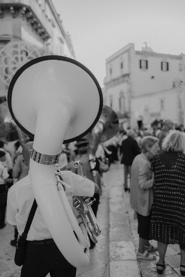 a person with a tuba in a city