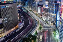 time lapse photography of vehicles on road at night
