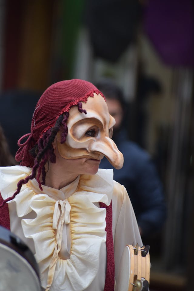 street performer in traditional mask murcia
