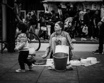 street performer on sidewalk