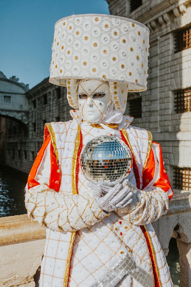 venetian carnival costume with disco ball