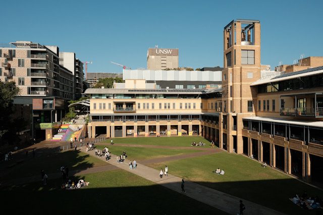 a large building with a clock tower in the middle of it