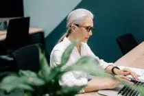 woman using laptop inside an office