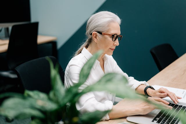 woman using laptop inside an office