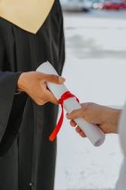 a person holding a paper roll