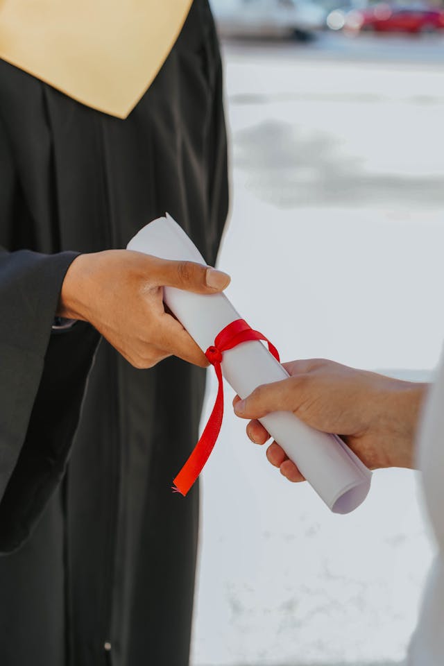 a person holding a paper roll