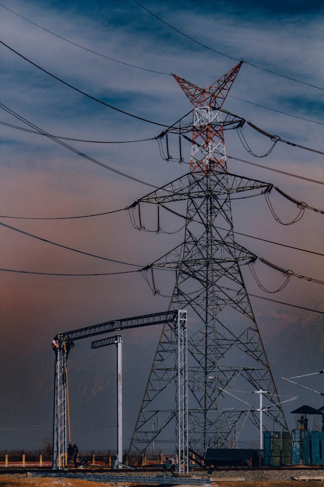 a utility pole under blue sky