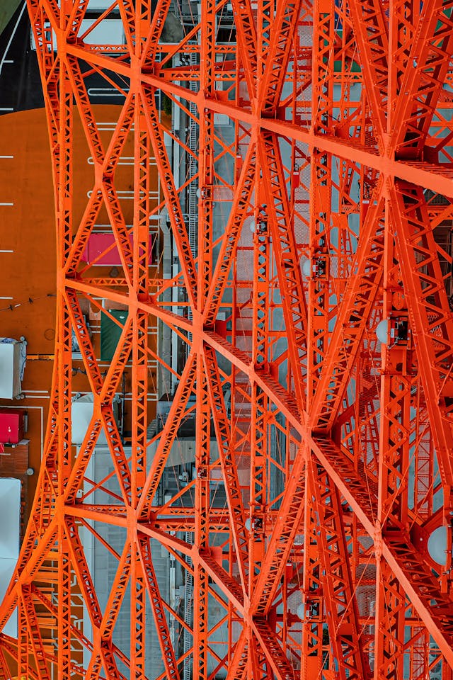 intricate orange steel structure close up